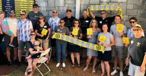 Oglethorpe alumni cheering on the Petrel soccer teams