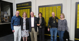 Alumni and donors gather for the trophy case dedication during Alumni Weekend 2023