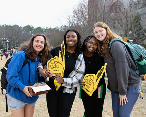 Friends celebrating Oglethorpe Day on the quad.